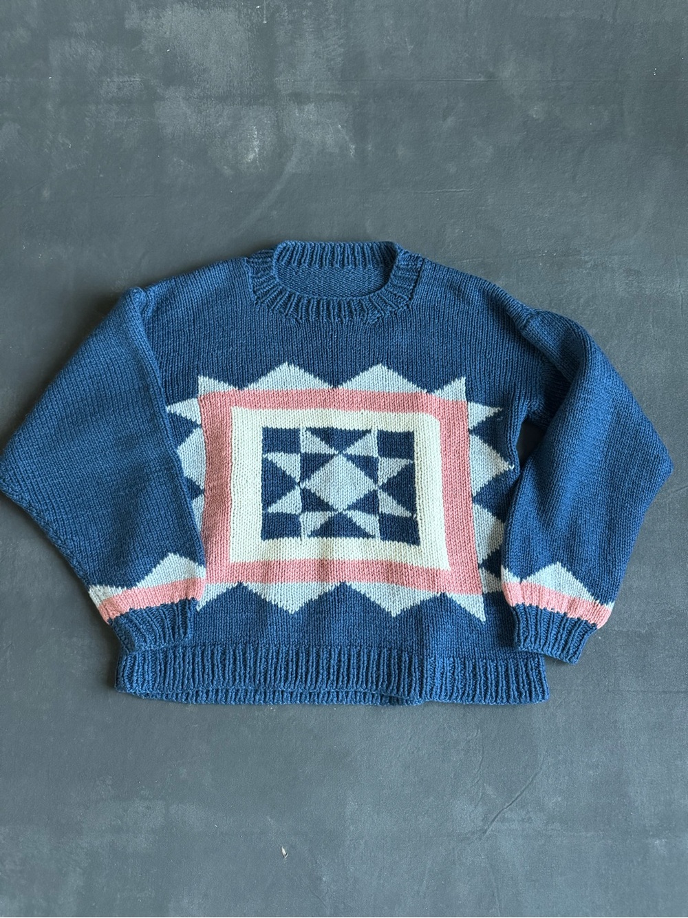 Blue Geometric Pattern Crewneck Sweater with Pink & White Accents